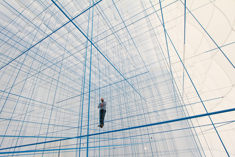 Illustration for article titled Weird giant room full of strings or inter-dimensional jail, you decide
